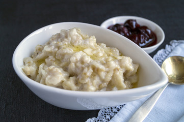 Healthy Breakfast. Oatmeal in a white bowl
