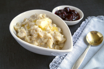 Healthy Breakfast. Oatmeal in a white bowl