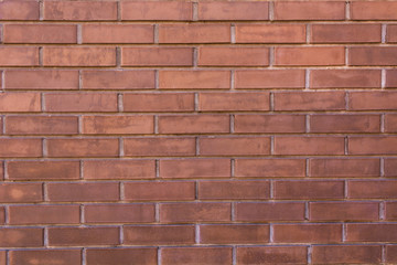 Background of the red brick wall with horizontal masonry