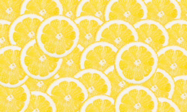 Lemon slices vibrant background.
