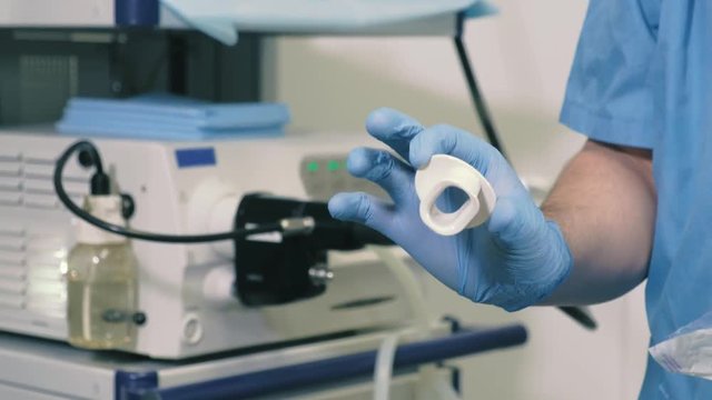 Doctor makes a gastroscopy young girl through the mouth 4k