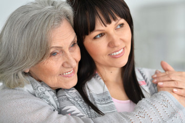 Beautiful elderly mother with an adult daughter