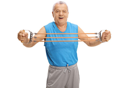 Mature Man Exercising With A Resistance Band