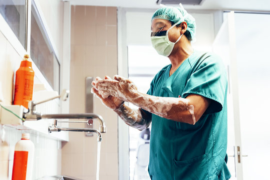 Doctor Washing Hands Before Operating.