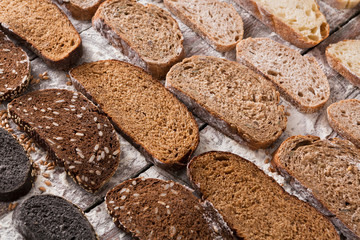 Bakery concept. Plenty of sliced bread background