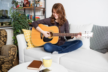 Girl with an acoustic guitar