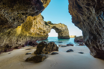 Sandy beach and cliffs in Algarve Atlantic coast, Portugal