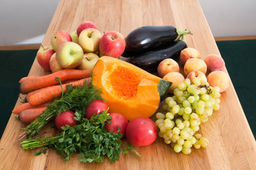 Fruit and vegetables on wooden table