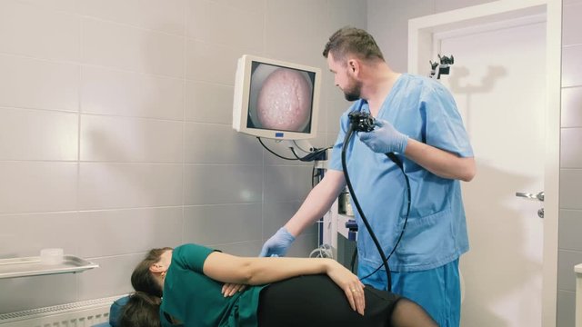 Doctor makes a gastroscopy young girl through the mouth 4k