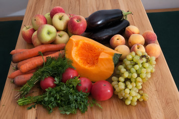 Fruit and vegetables on wooden table