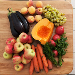 Fruit and vegetables on wooden table