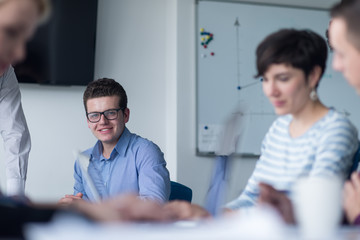 Group of young people meeting in startup office