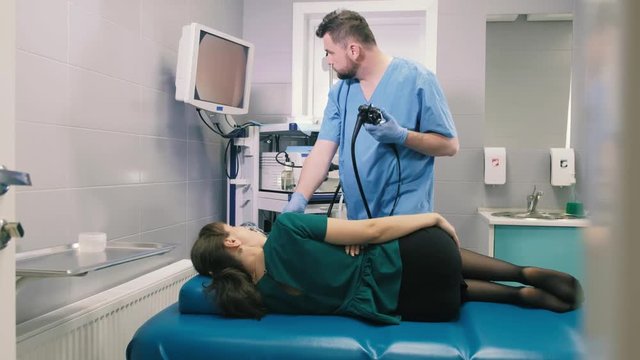 Doctor makes a gastroscopy young girl through the mouth 4k