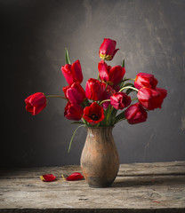 Still life with yellow tulips