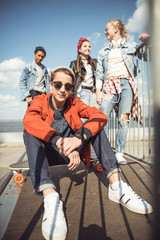 Obraz na płótnie Canvas teenagers spending time at skateboard park, teenagers having fun concept