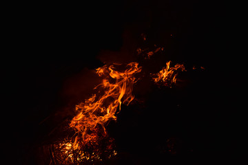 Burning of rice straw at night.