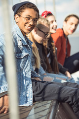 Fototapeta na wymiar teenagers spending time at skateboard park, teenagers having fun concept