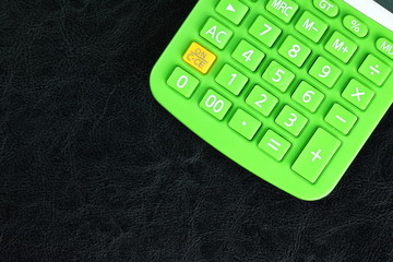 Close up photo of solar and battery power calculator show the calculator numeric button.