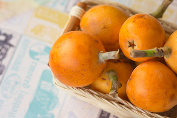loquats on kitchen counter background.