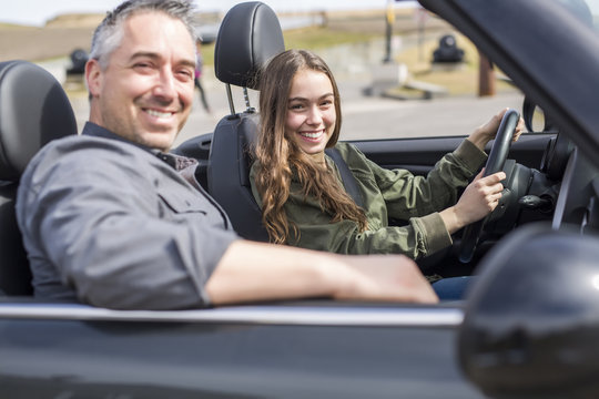 Teen Learning To Drive Or Taking Driving Test.