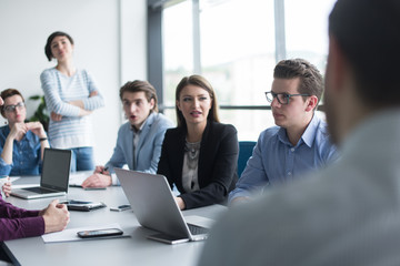 Business Team At A Meeting at modern office building