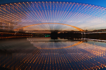 Troja bridge Prague over the Vltava river in the night with illumination. Trojsky most . Czech Republic - obrazy, fototapety, plakaty