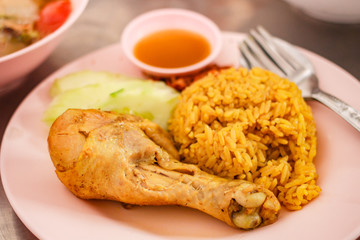 Muslim yellow jasmine rice with chicken (Khao mok kai).