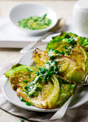 Baked cabbage with onion mustard sauce