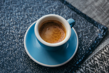 Delicious morning freshly brewed espresso coffee with a beautiful tiger crema. Photo is made in...