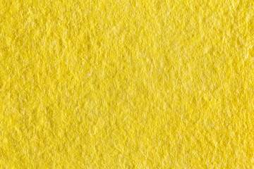 Vibrant yellow cloth kitchen napkins isolated on white.