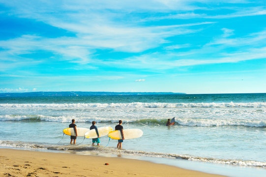 Surfers going to surf