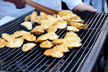 Traditional smoked sheep cheese on the grill