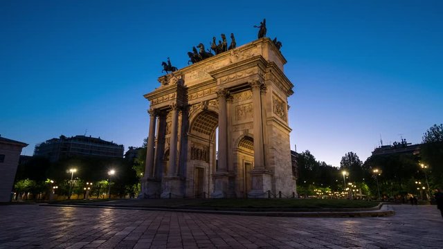 Sunset view of the Arch of Peace (Arco della Pace) in Sempione Park, Milan, Italy. Time lapse.