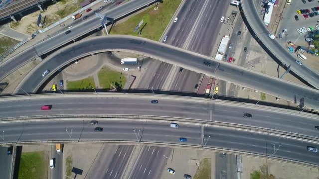 Aerial 4K footage. Flying over road junction in city