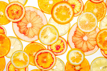 Bright sweet citrus slices on white