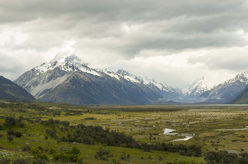 Mount Cook green valley in a cloudy, rainy day
