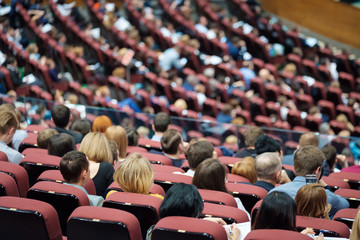 Audience listens to the speech of the lecturer in the conference hall