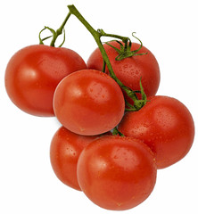 Fresh bright red vine tomatoes, isolated against a white background.