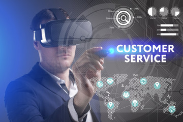 Business, Technology, Internet and network concept. Young businessman working in virtual reality glasses sees the inscription: Customer service
