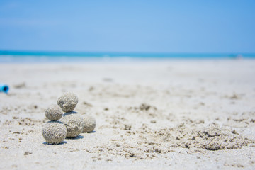 ball sand on the beach and blue sea