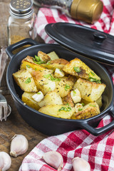 Baked potato, roasted potatoes with rosemary. Selective focus