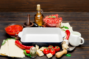 lasagna ingridients on wooden table