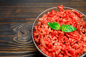 Minced meat of stuffing in glass bowl
