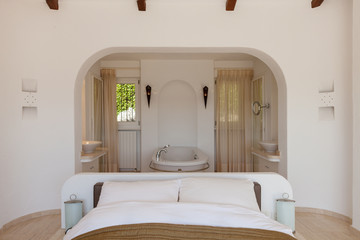 Elegant bedroom with bath tube. Front view with the bed in the foreground. No one inside the room