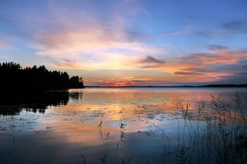 Fototapeta na wymiar Beautiful sunset on lake. Karelia