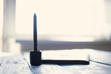 Graphic designer equipment on the table including pen tablet