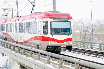 Fototapeta premium Light Rail Train on a Snowy Winter Day