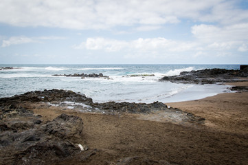 Fototapeta na wymiar Cliffs of Las Palmas de Gran Canaria, Canary Islands, Spain, Atlantic Ocean - Stock Photo
