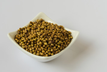 Corriander the spice in a bowl