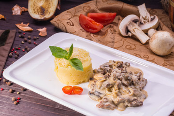 Beef Stroganoff. Juicy veal, stewed with mushrooms and onions in gentle creamy sauce